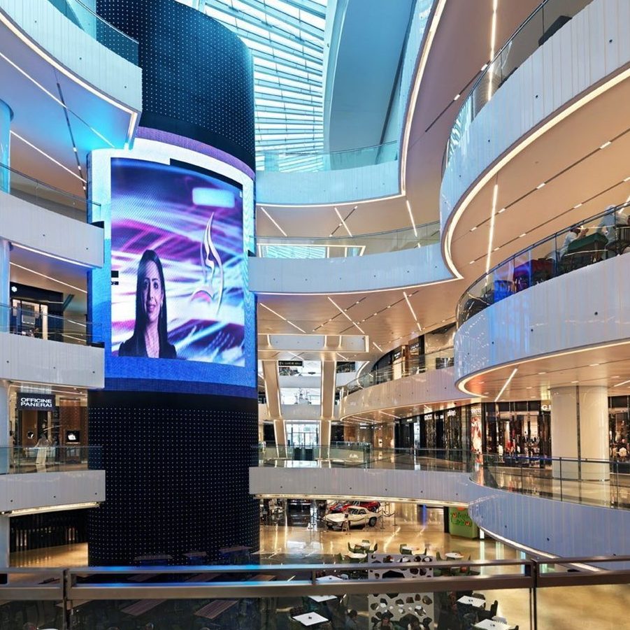 Image shows a large digital screen inside a large mall