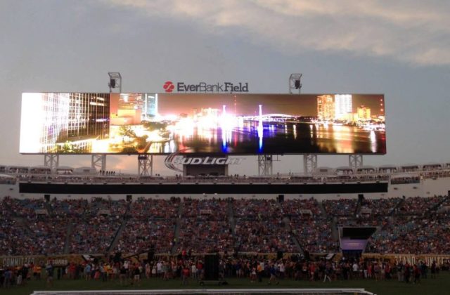 Image shows a large panoramic screen at a sport stadium