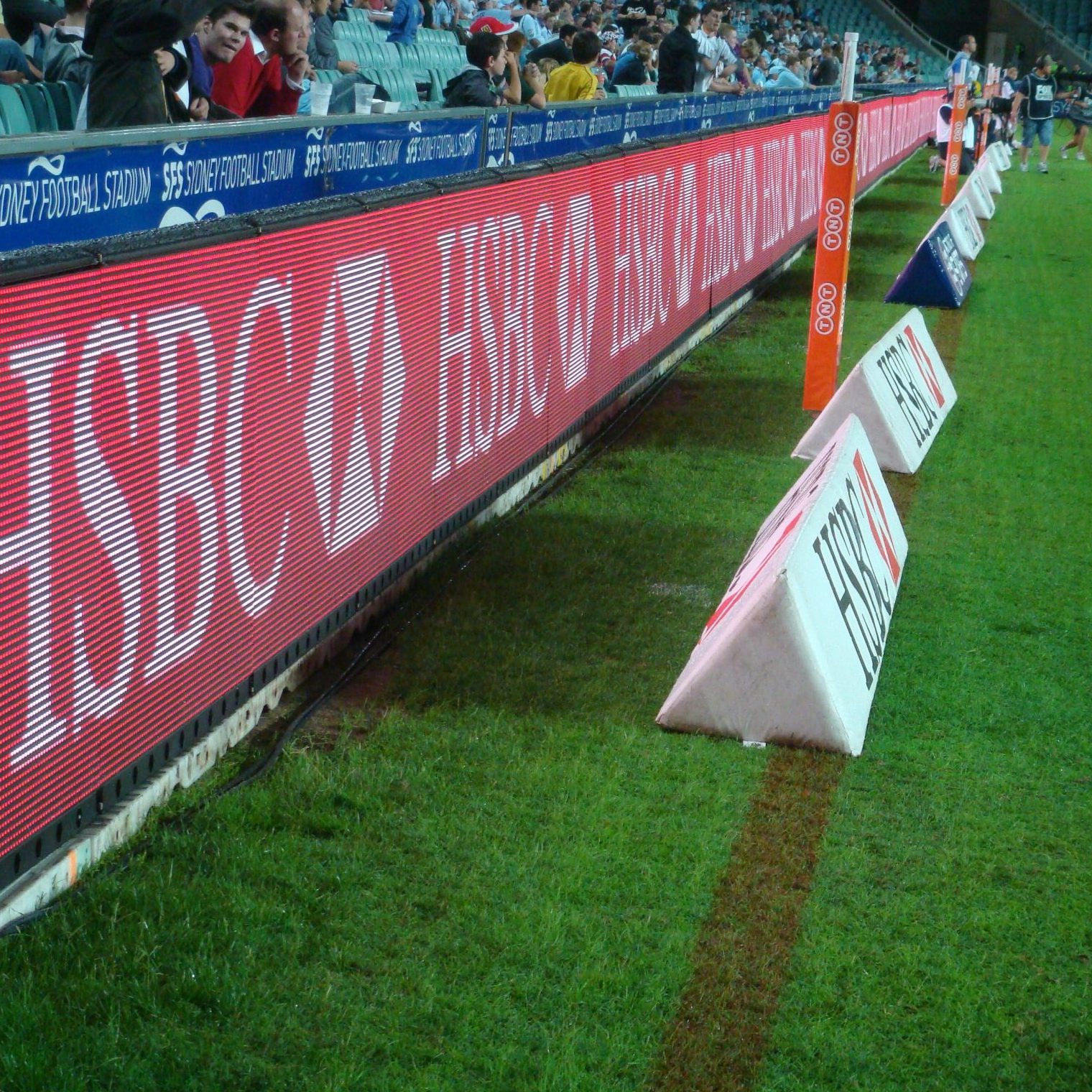 Image shows digital screen perimeter boards at a football match
